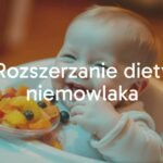 A happy baby eating mashed fruits, high chair, colorful food, soft lighting, warm and joyful atmosphere, realistic.